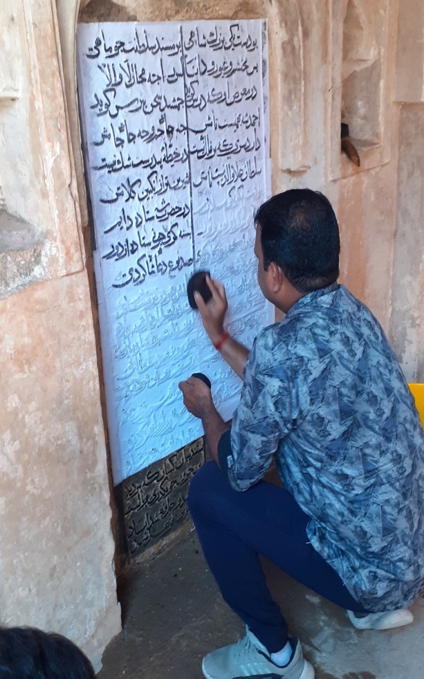 Taking Estampages of Arabic &Persian inscriptions by the staff of this office